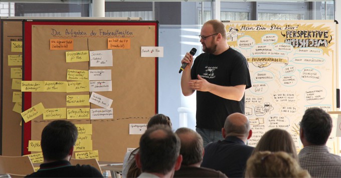 Marek Lange (SGD) präsentiert die Ergebnisse des Workshops